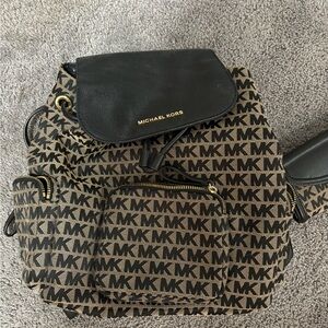 Michael Kors backpack and wallet in great condition